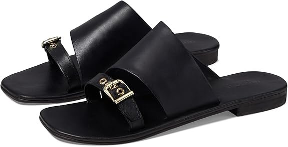 Sandales plates noires Free People en cuir avec large bride épurée et boucle discrète, style minimaliste garde-robe capsule été